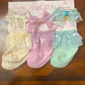 Ava Olivia baby socks with matching headbands.